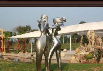东营一对动感传情的不锈钢跳舞情侣雕塑