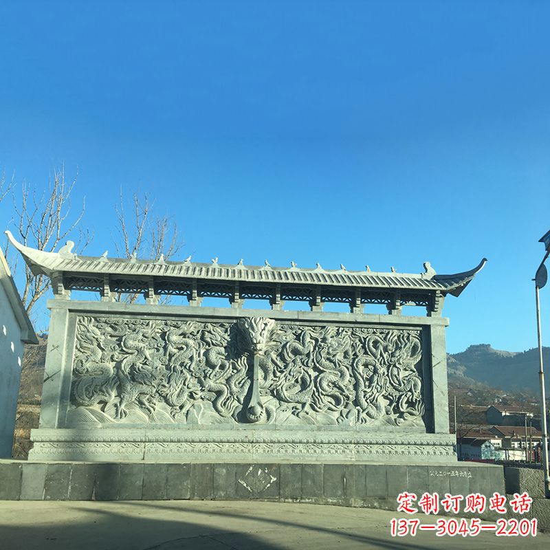 东营青石九龙壁，精美雕塑饰衬城市广场