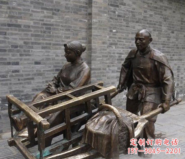 东营推独轮车的人物铜雕